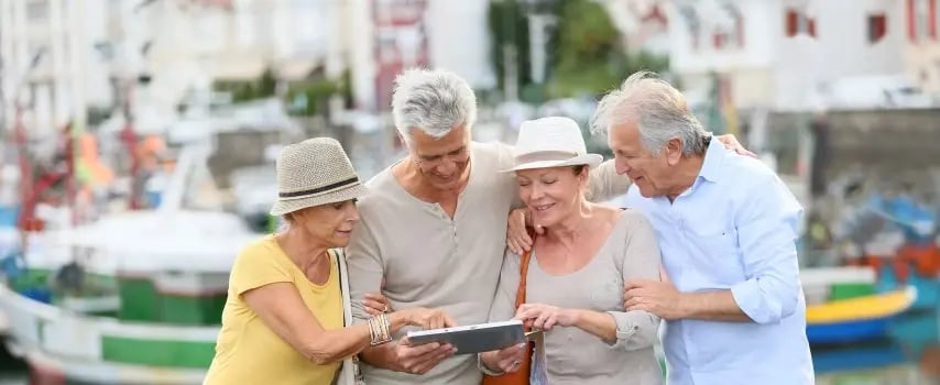 senior-couples-looking-at-map-together